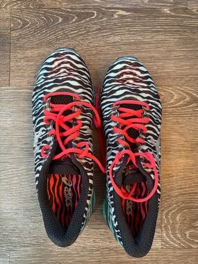 Woman’s asics shoes. Like new. Awesome colors.